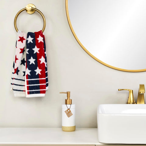 SKL Home towel on countertop beside dishware showing 16x25 size reference