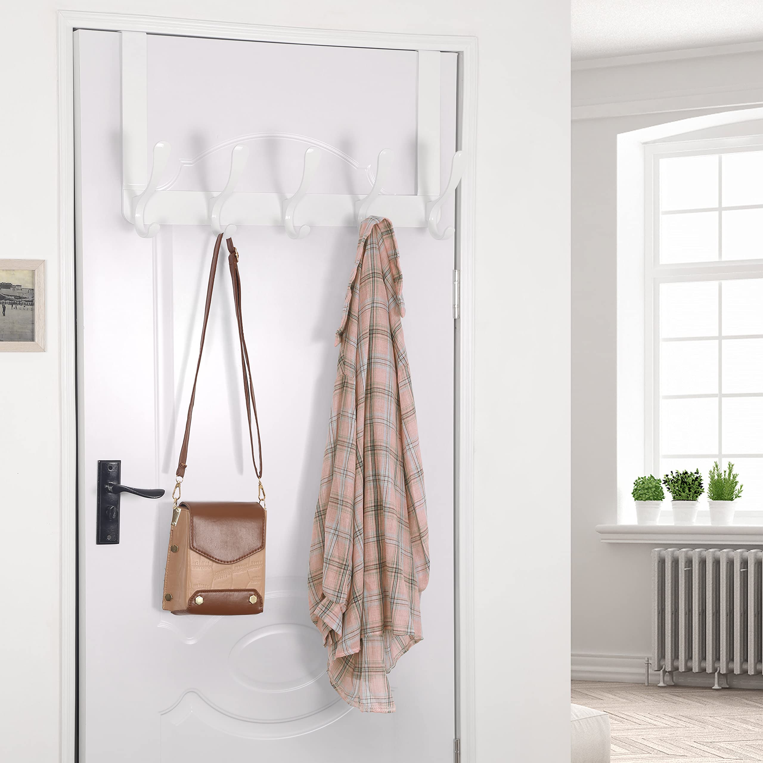 SKOLOO hanger in bathroom with towel and robe showing convenient access benefit