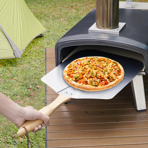 Skyflame peel beside pizza to show scale and usable surface area