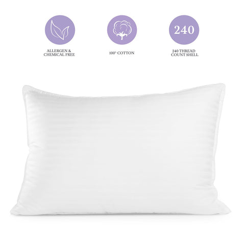 Sleep Restoration pillows on a made bed illustrating comfort and stylish bedding