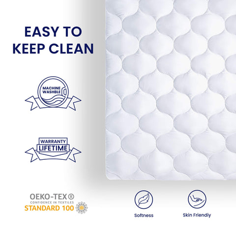 SLEEP ZONE mattress pad in a styled bedroom adding visible plush comfort