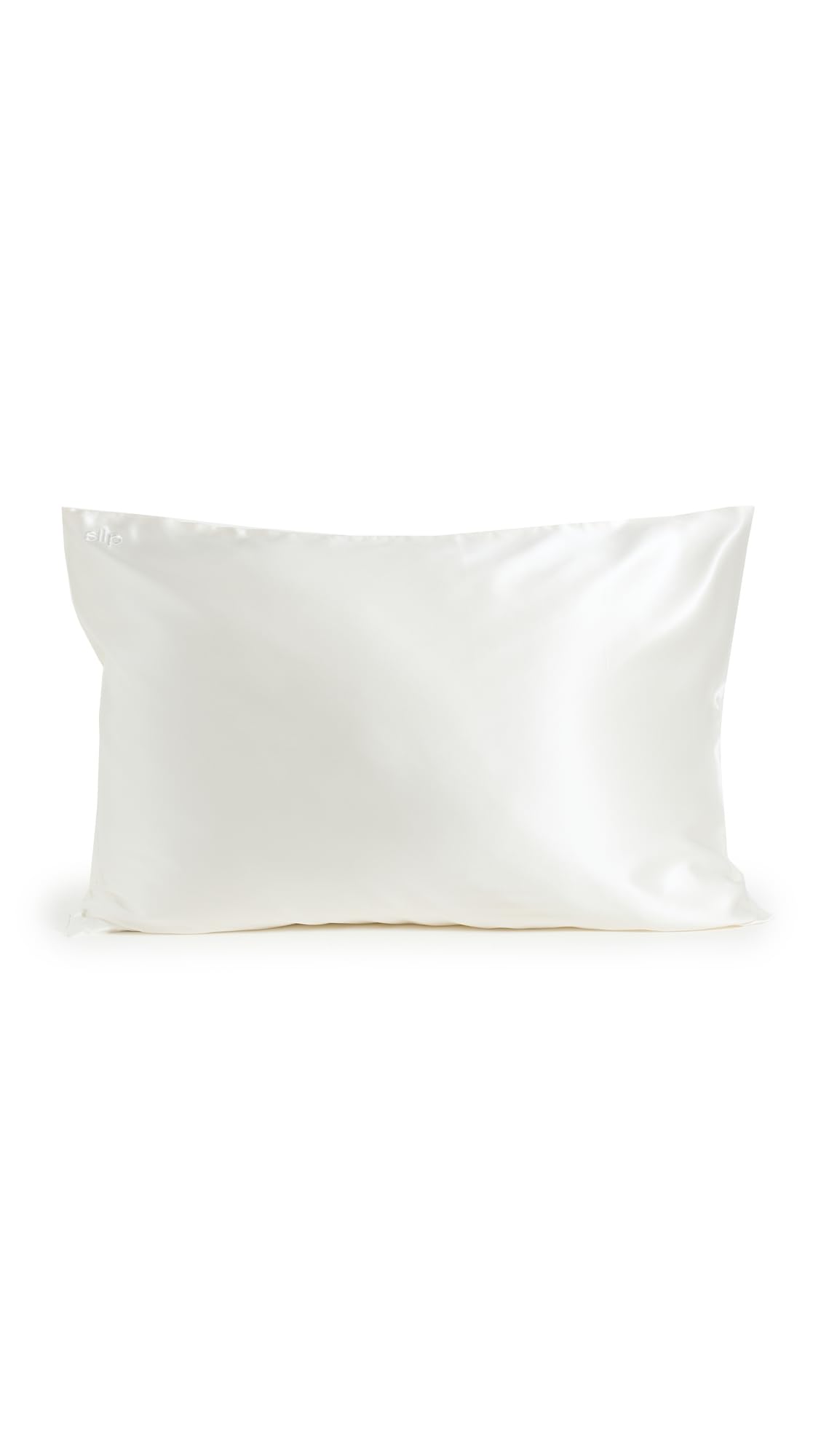 SLIP pillowcase styled on a bed to illustrate elegant bedroom pairing