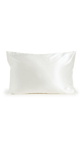 SLIP pillowcase styled on a bed to illustrate elegant bedroom pairing