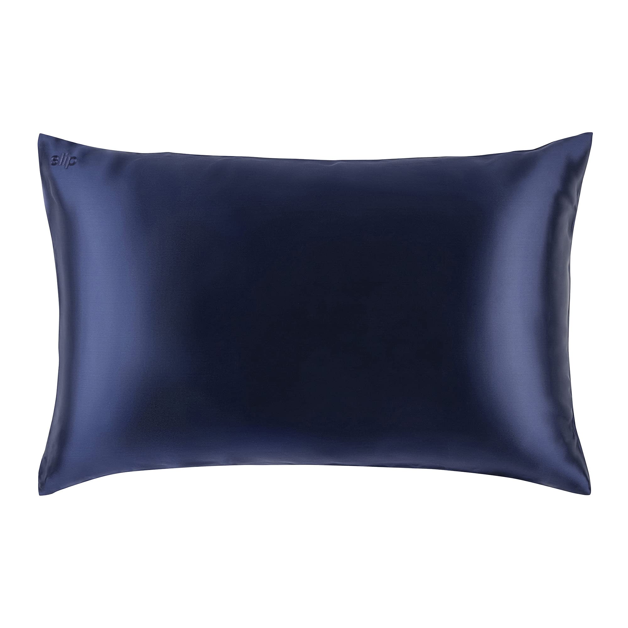 SLIP navy pillowcase styled on bed demonstrating elegant bedroom look