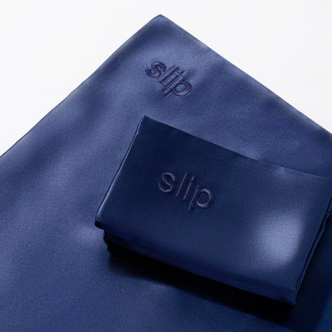 SLIP navy pillowcase comparison showing fewer sleep creases benefit