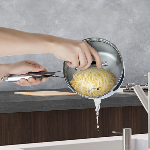 SLOTTET steamer basket fitted inside saucepan steaming vegetables for quick meals