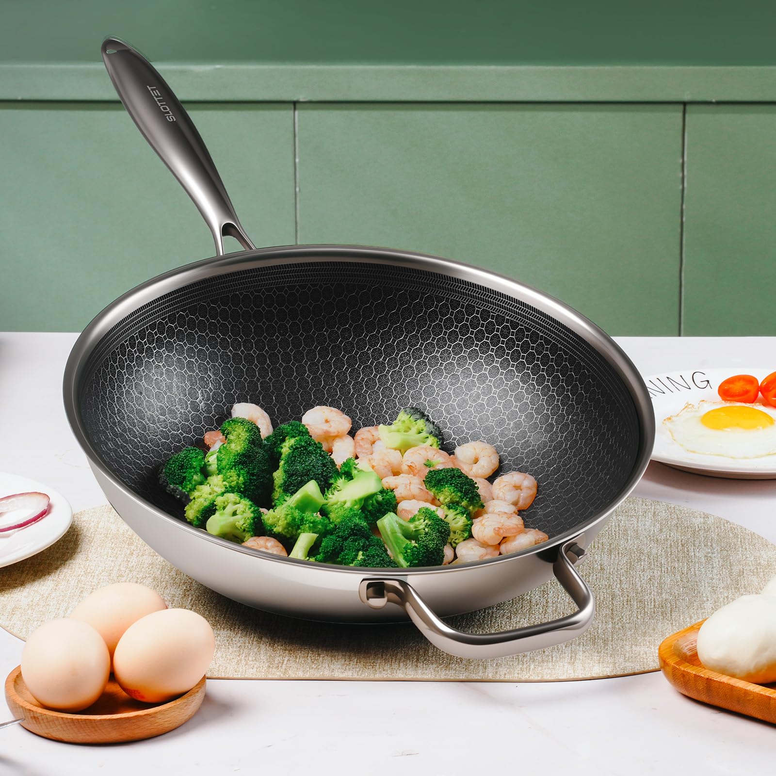 SLOTTET wok beside measuring tools for scale, illustrating generous 12-inch cooking surface