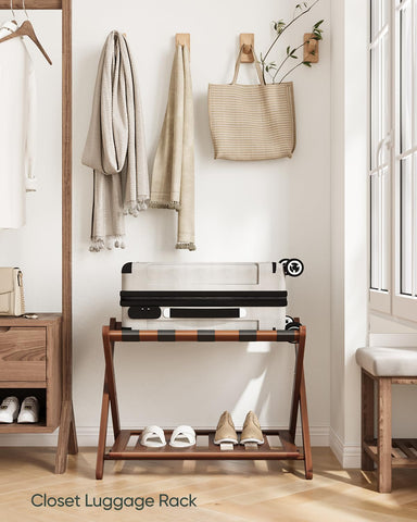 Smart FENDEE luggage rack holding a large suitcase showing reliable weight support