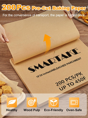 SMARTAKE cookies sliding off parchment to show non-stick release and easy cleanup