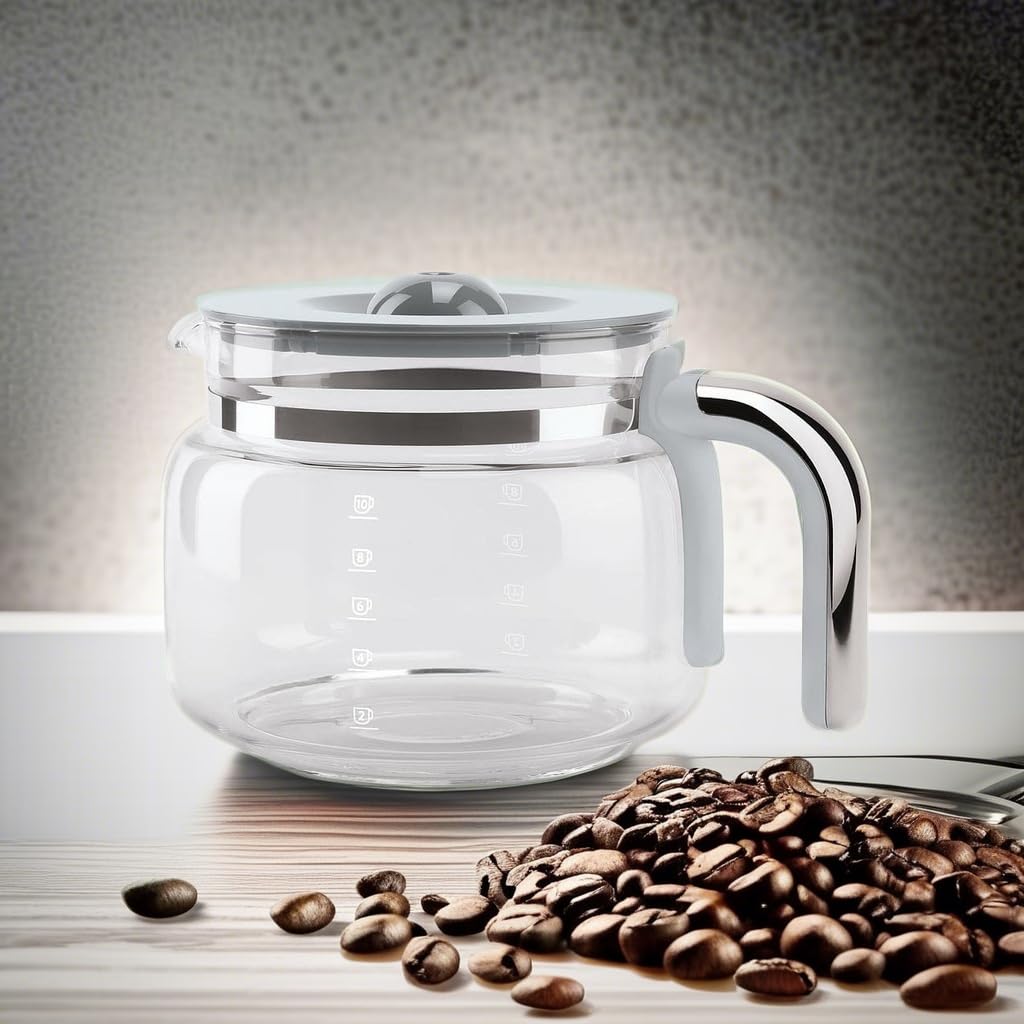 SMEG carafe held by hand to show scale and comfortable handling