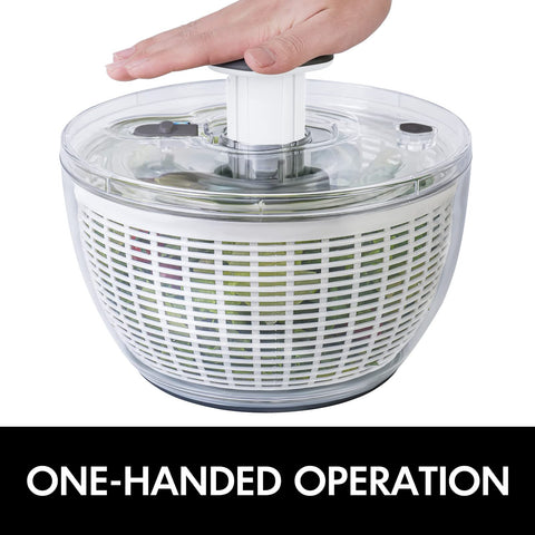 Smile mom spinner in use washing and spinning lettuce for fast meal prep