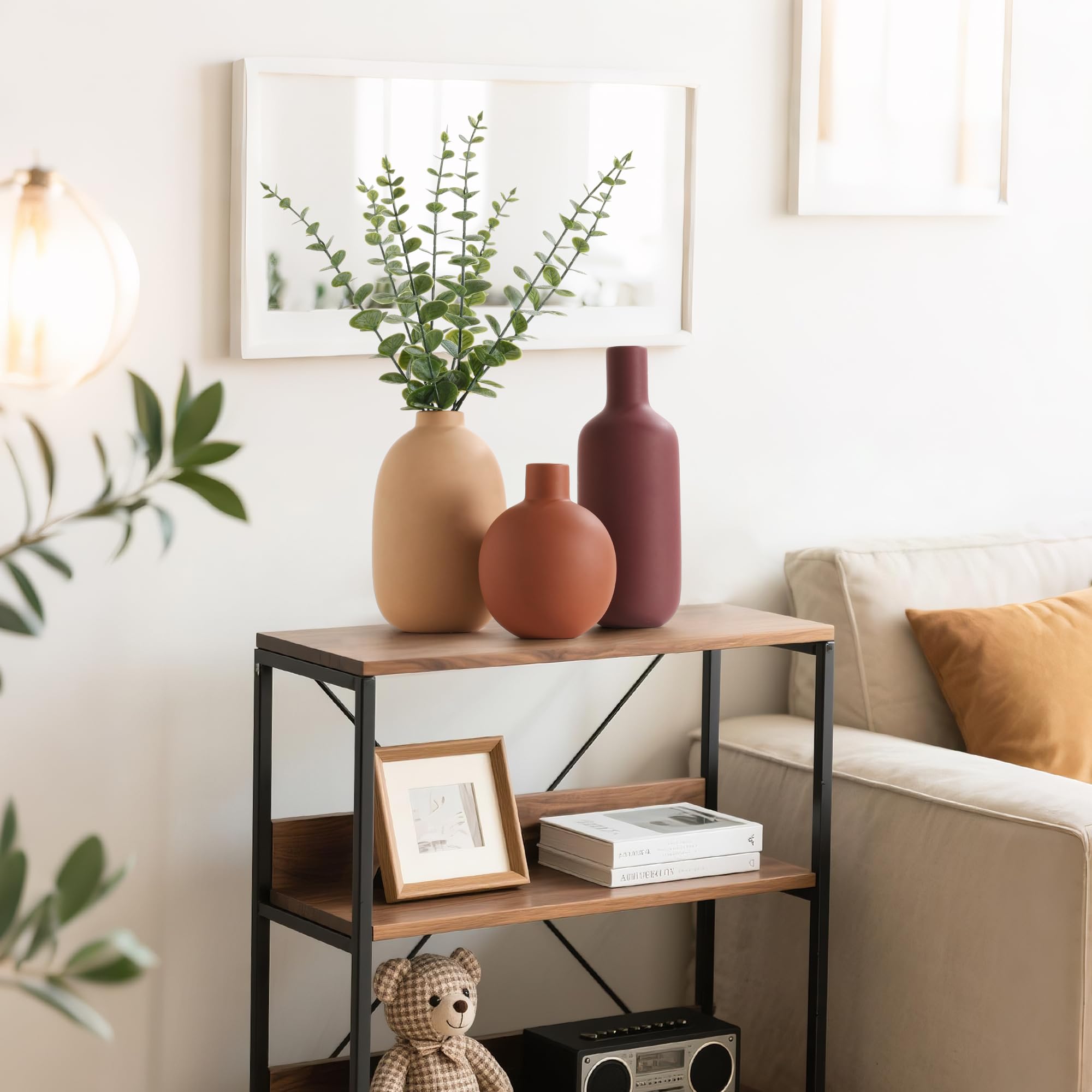 Smiletag vases styled on mantel illustrating layered styling benefit