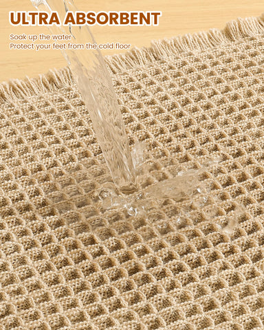 Smiry mat in bathroom by shower illustrating fast water absorption and warm decor