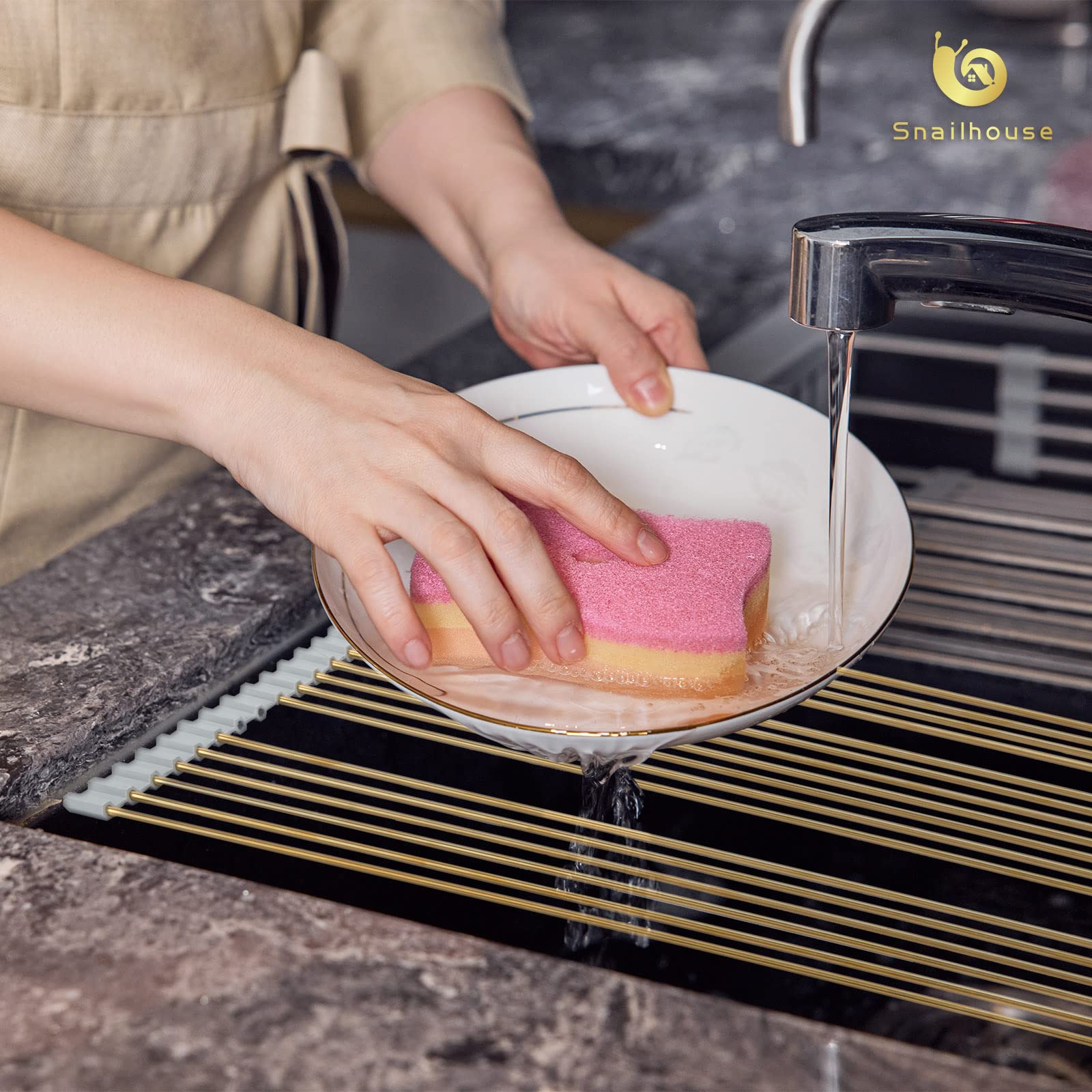 Snailhouse draining dishes on rack over sink for quicker air drying