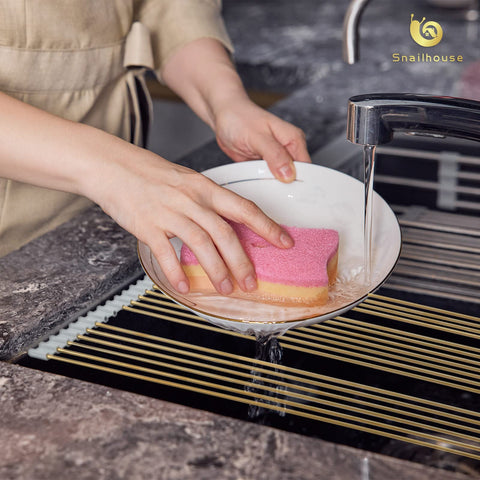 Snailhouse draining dishes on rack over sink for quicker air drying