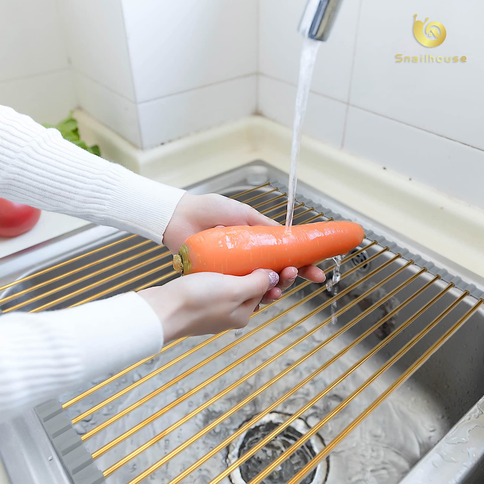 Snailhouse styled on countertop in kitchen offering decorative and functional use