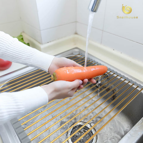 Snailhouse styled on countertop in kitchen offering decorative and functional use