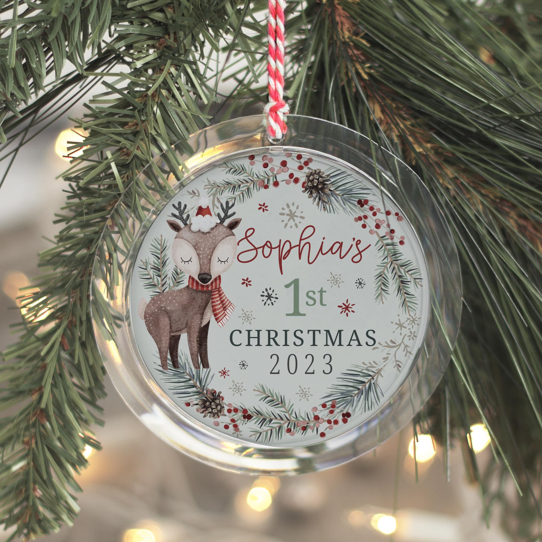 Snapins hanging on a Christmas tree showing personalized photos adding festive charm