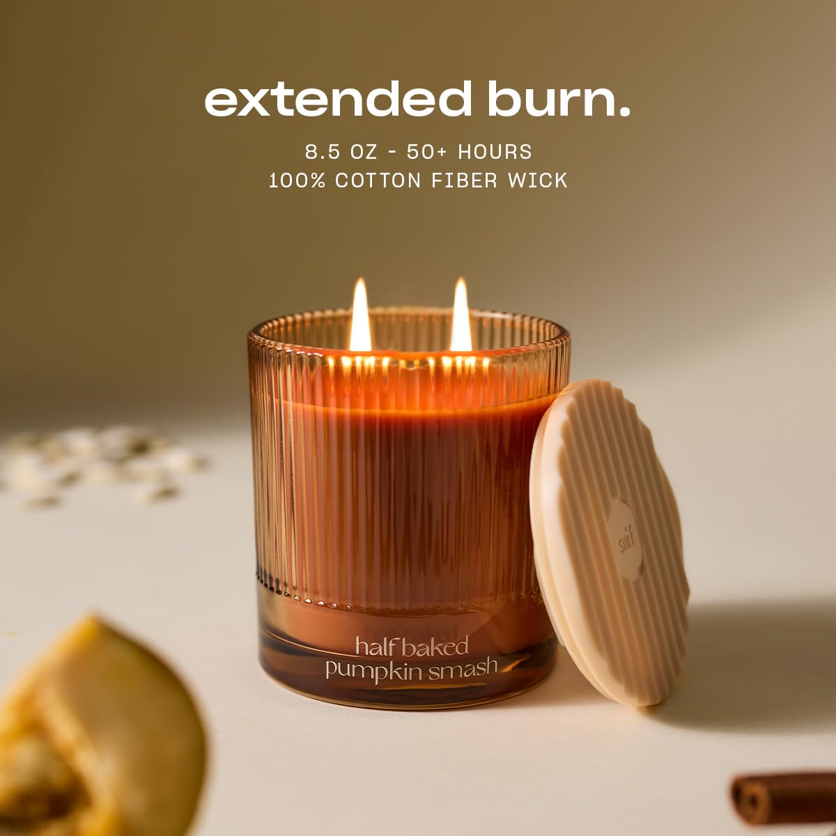 Snif candle beside a book to show 8.5oz scale and practical home sizing benefits