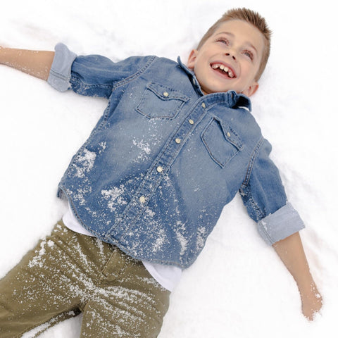 Snow in Seconds hands touching snow demonstrating cold-to-touch realism benefit