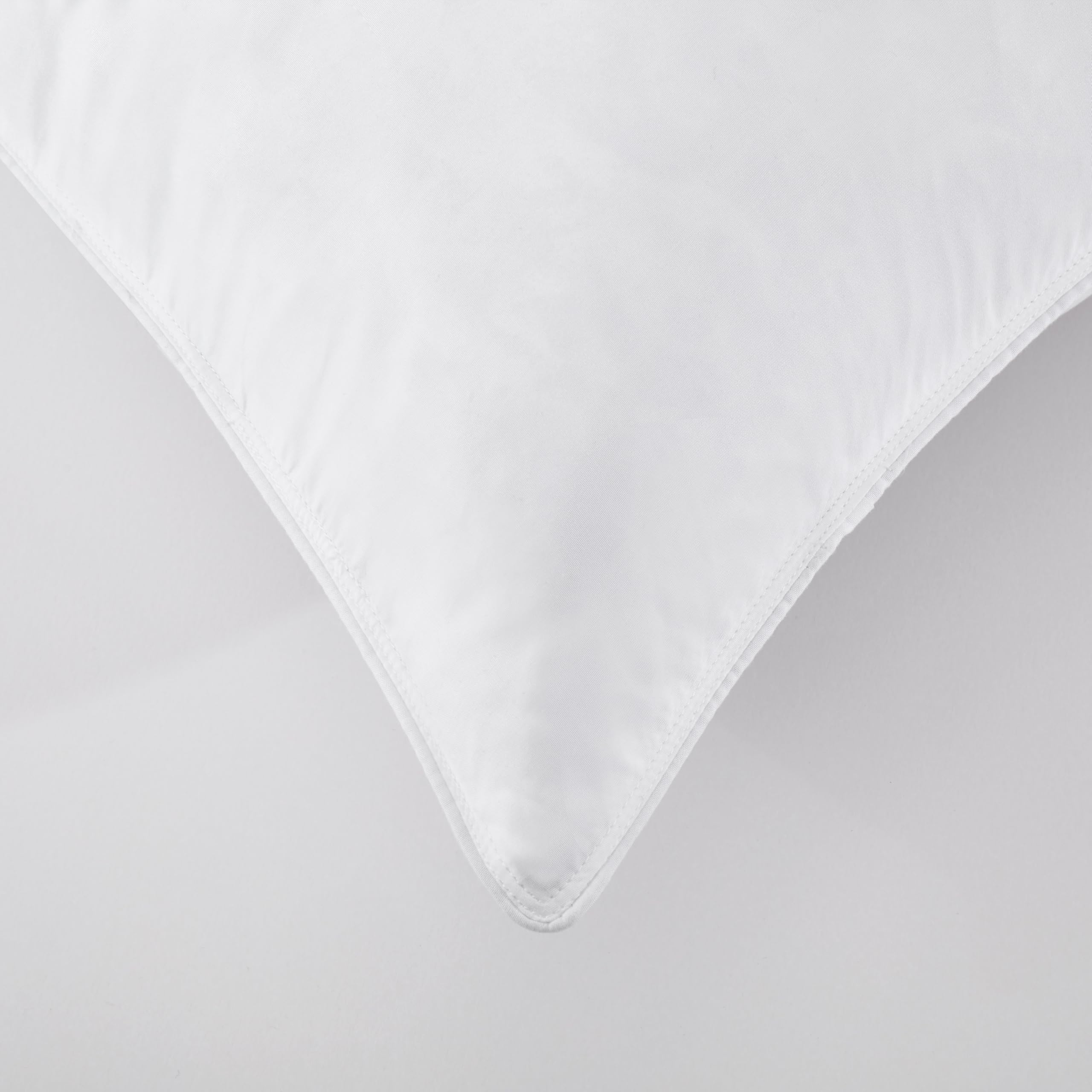 SNUG&COZY pillow next to a ruler showing 20×26 size benefit accurate fit