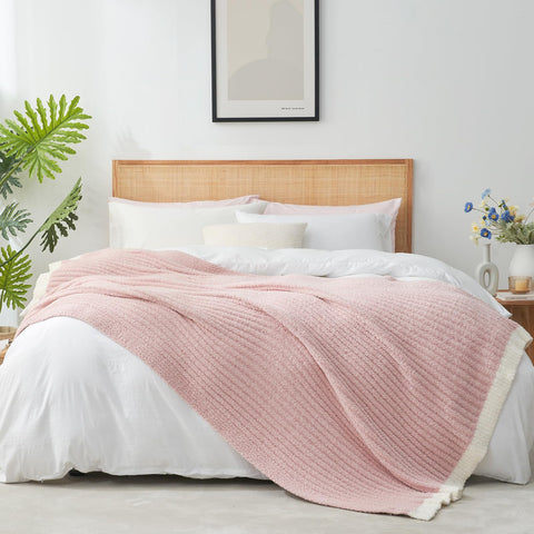 Snuggle Sac throw styled on bed adding warmth and decor