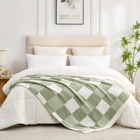 Snuggle Sac blanket draped over bed offering soft, decorative layer