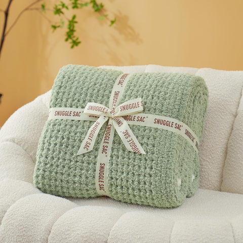 Snuggle Sac folded throw wrapped with bow ready for gifting and easy present appeal