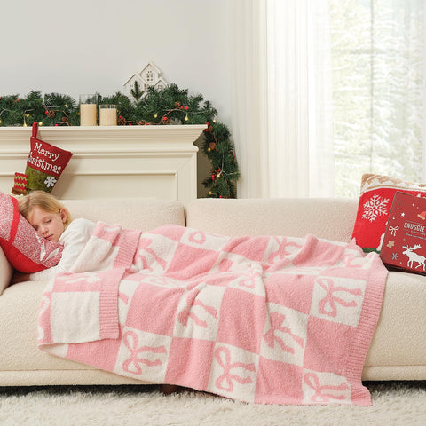 Snuggle Sac blanket draped on couch adding cozy decorative layer