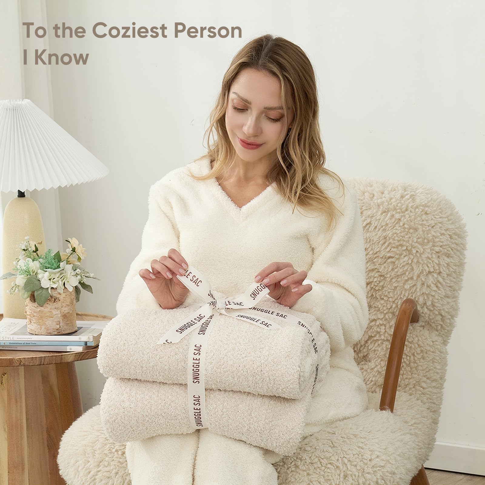 Snuggle Sac blanket next to ruler showing 60x80 size clarity benefit