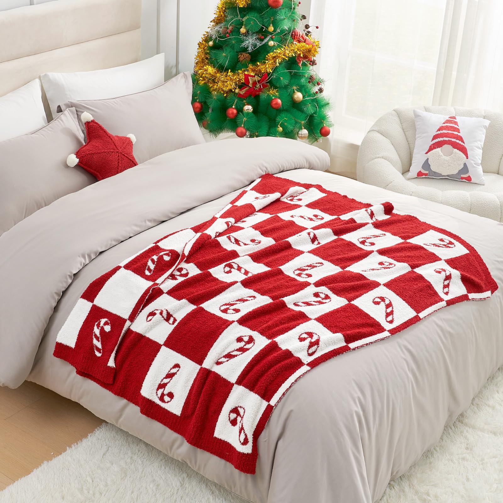Snuggle Sac family snuggling on couch using throw for comfort and togetherness