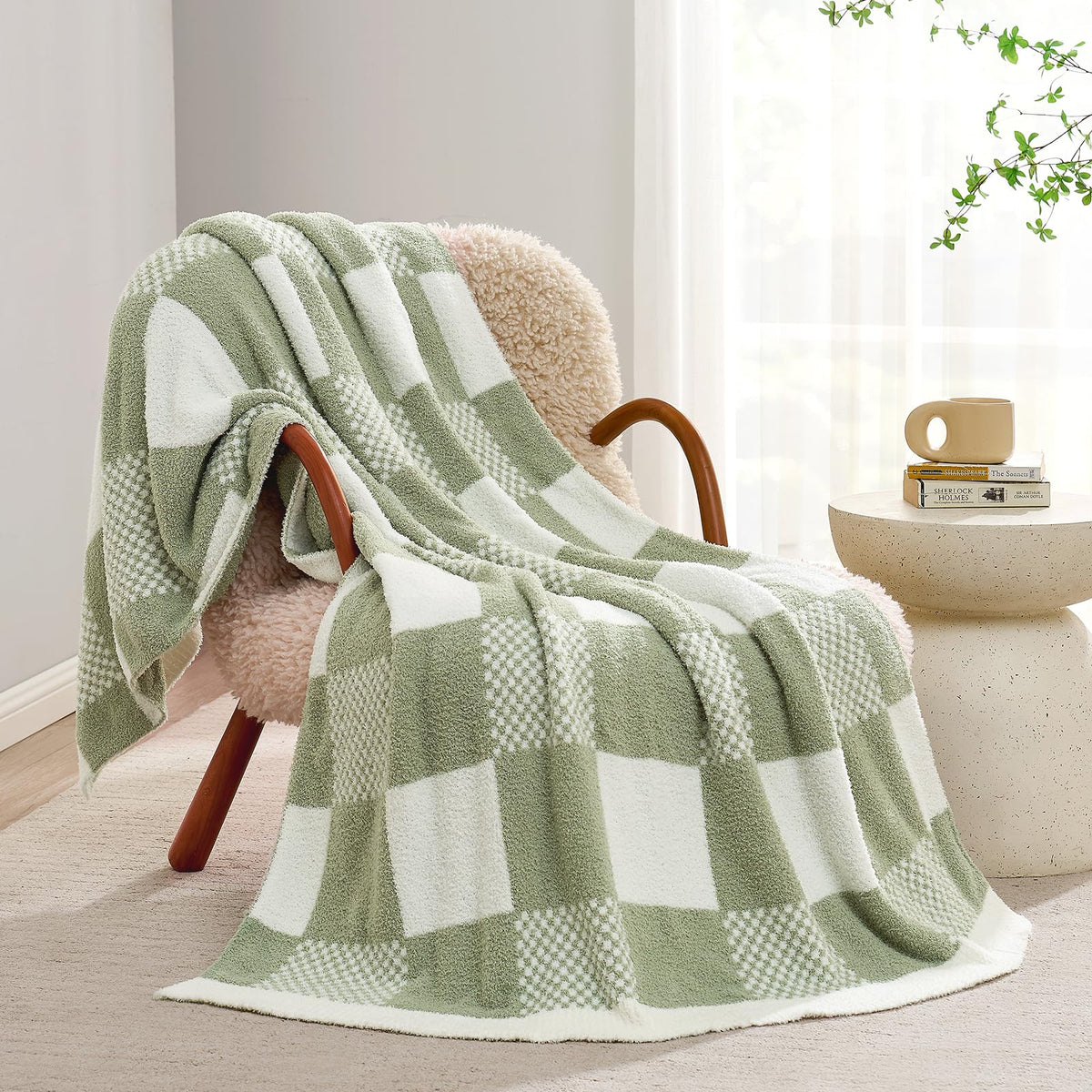 Snuggle Sac folded front view showing sage green checkered throw and soft feel