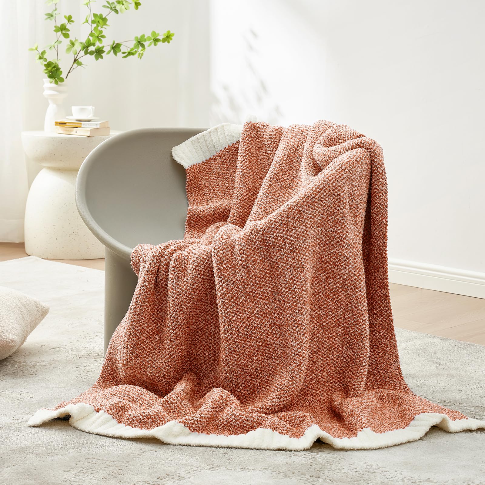 Snuggle Sac folded on bed showing oversized 50x70 scale