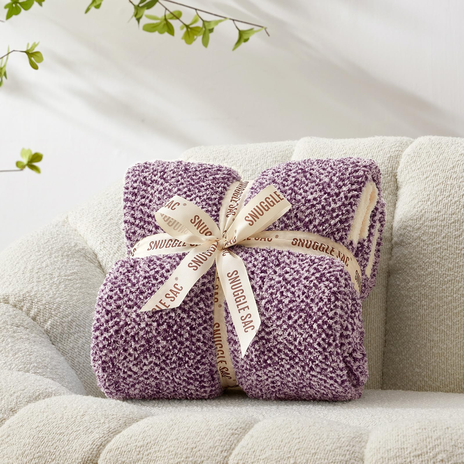 Snuggle Sac folded blanket on shelf highlighting compact storage and neat presentation