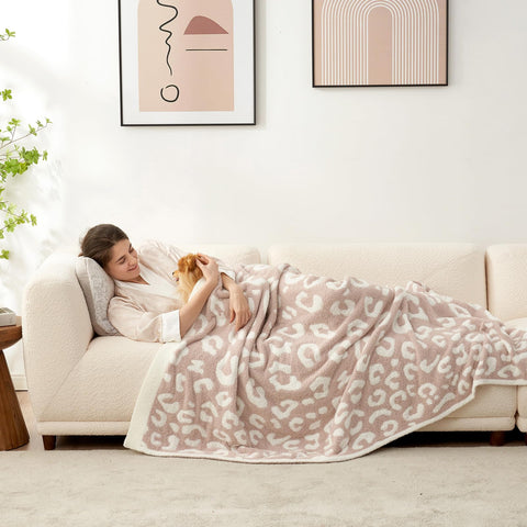 Snuggle Sac front packaging showing beige leopard pattern and ribbon gift-ready