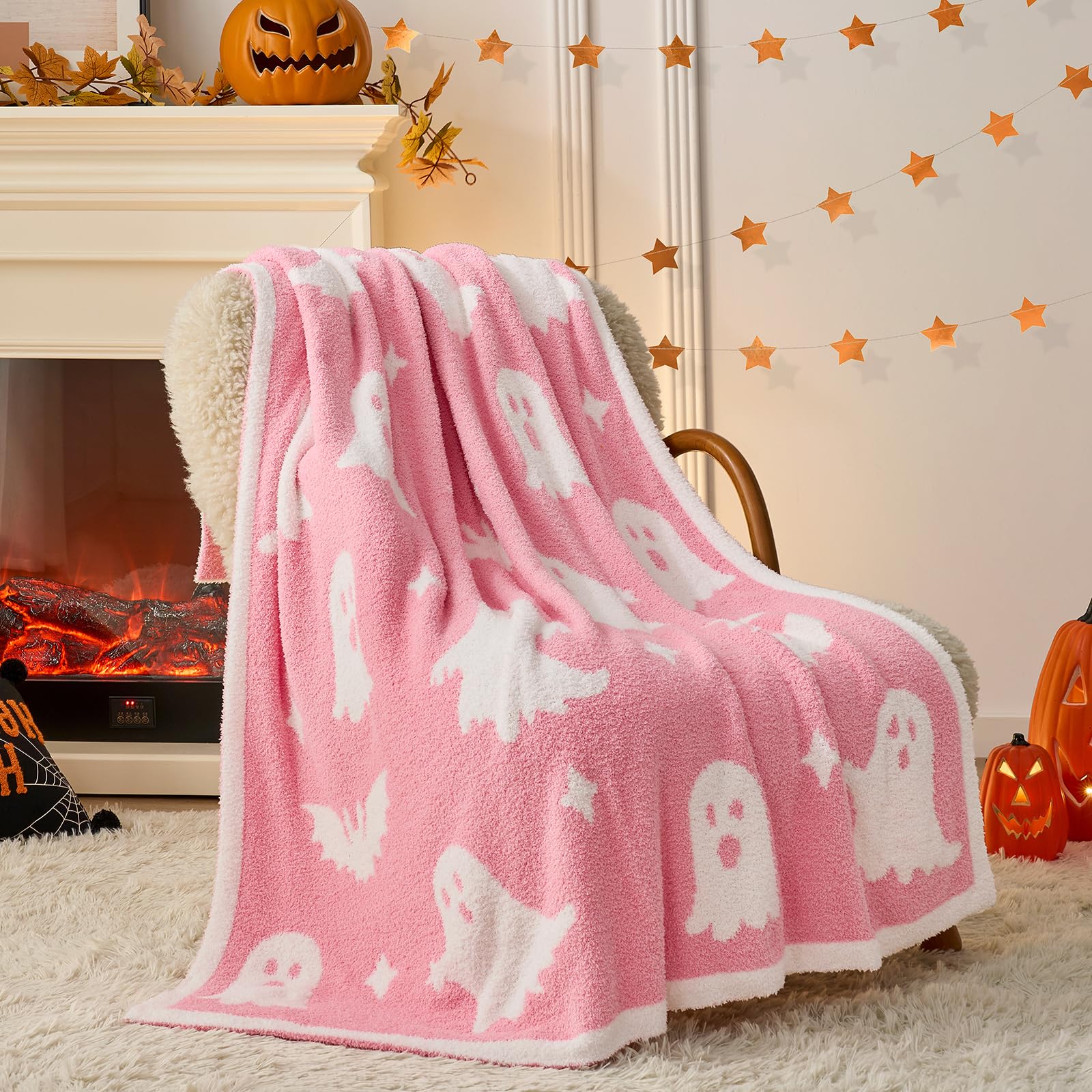 Snuggle Sac front view of pink ghost and bat throw showing festive decor benefit