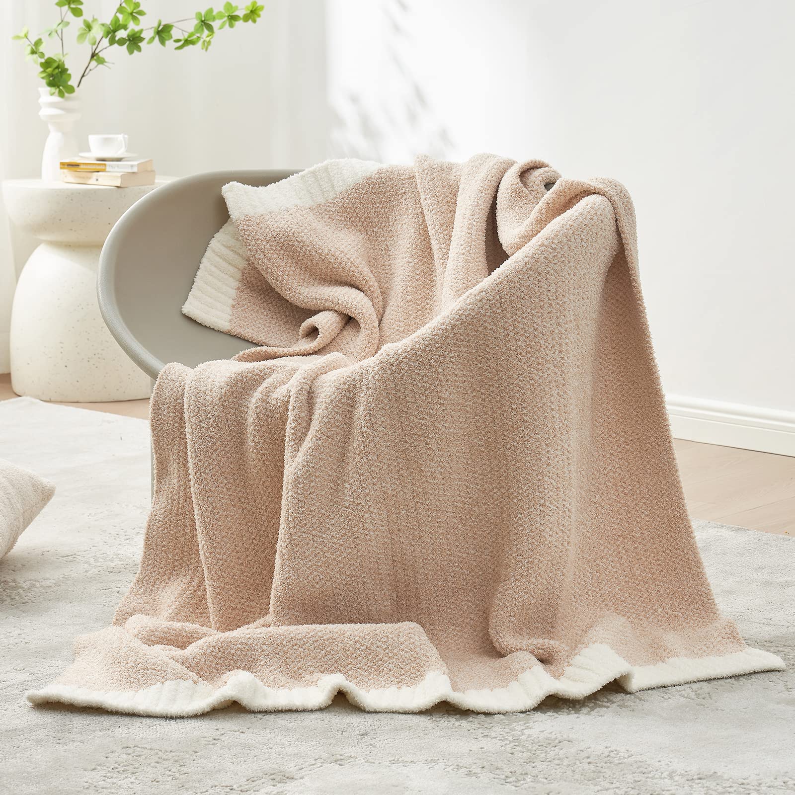 Snuggle Sac layered on bed providing lightweight warmth and decor