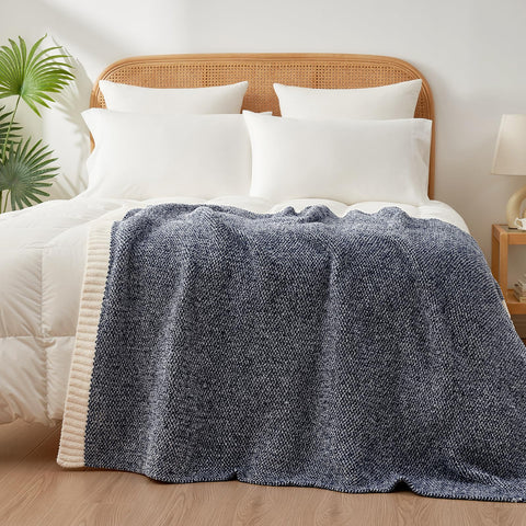 Snuggle Sac blanket in use on couch providing lightweight warmth and cozy relaxation