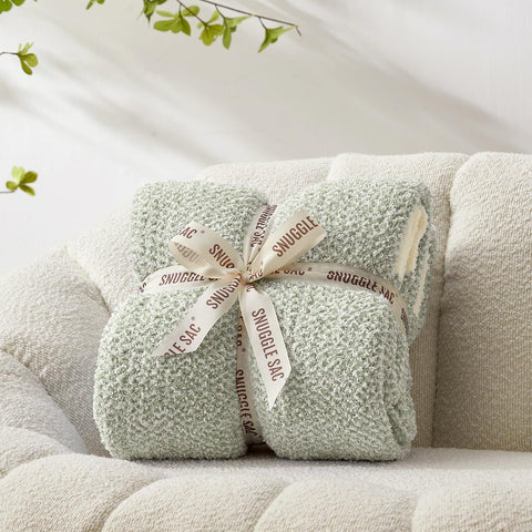 Snuggle Sac folded front view showing plush throw and elegant color