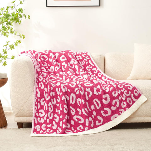 Snuggle Sac draped on sofa showing bold pink accent elevates living room decor
