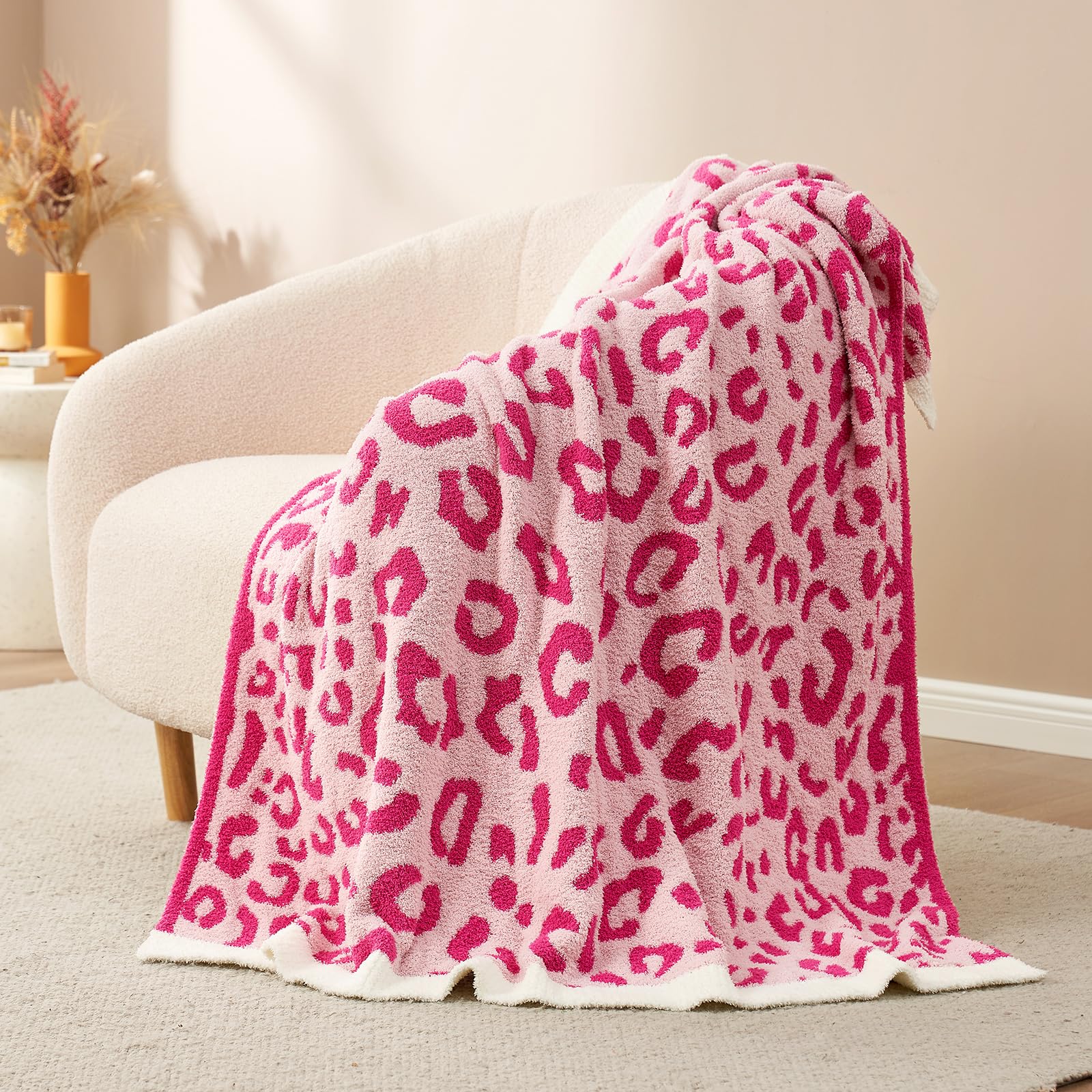 Snuggle Sac reversible view displaying cheetah pattern and solid back for versatility