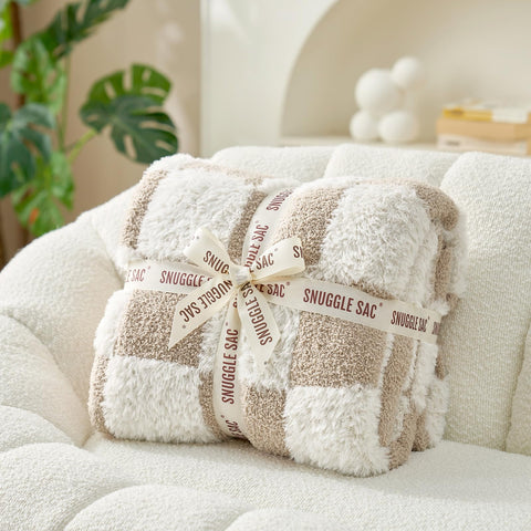 Snuggle Sac product label and silk ribbon packaging presenting gift-ready quality