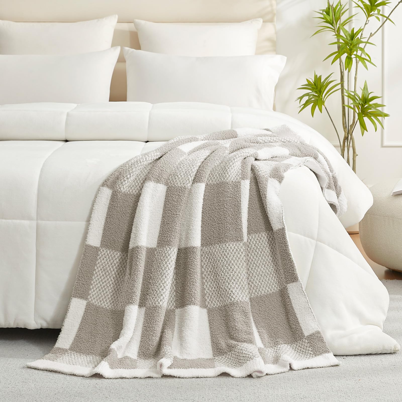 Snuggle Sac draped on sofa in living room adding warmth and decor benefit