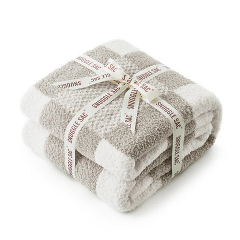 Snuggle Sac used at an outdoor picnic offering portable warmth and comfort