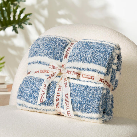 Snuggle Sac folded in travel bag showing portability and lightweight convenience