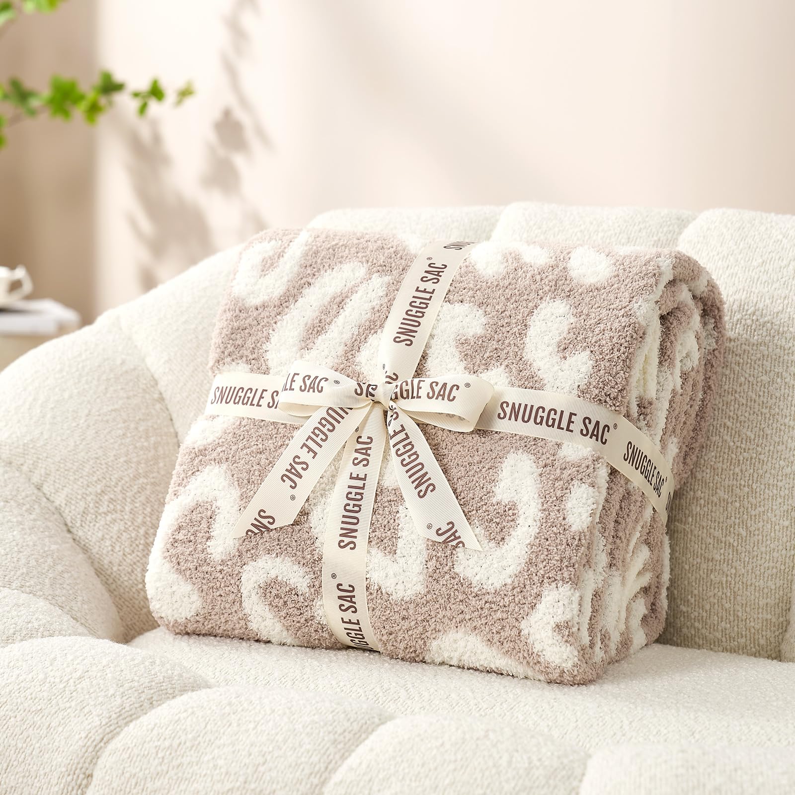 Snuggle Sac reversible side with cheetah print and beige underside for styling