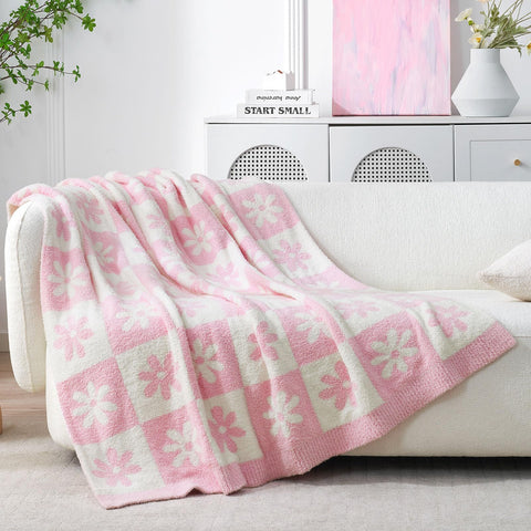 Snuggle Sac flatlay of reversible checkered and floral pattern showing styling options