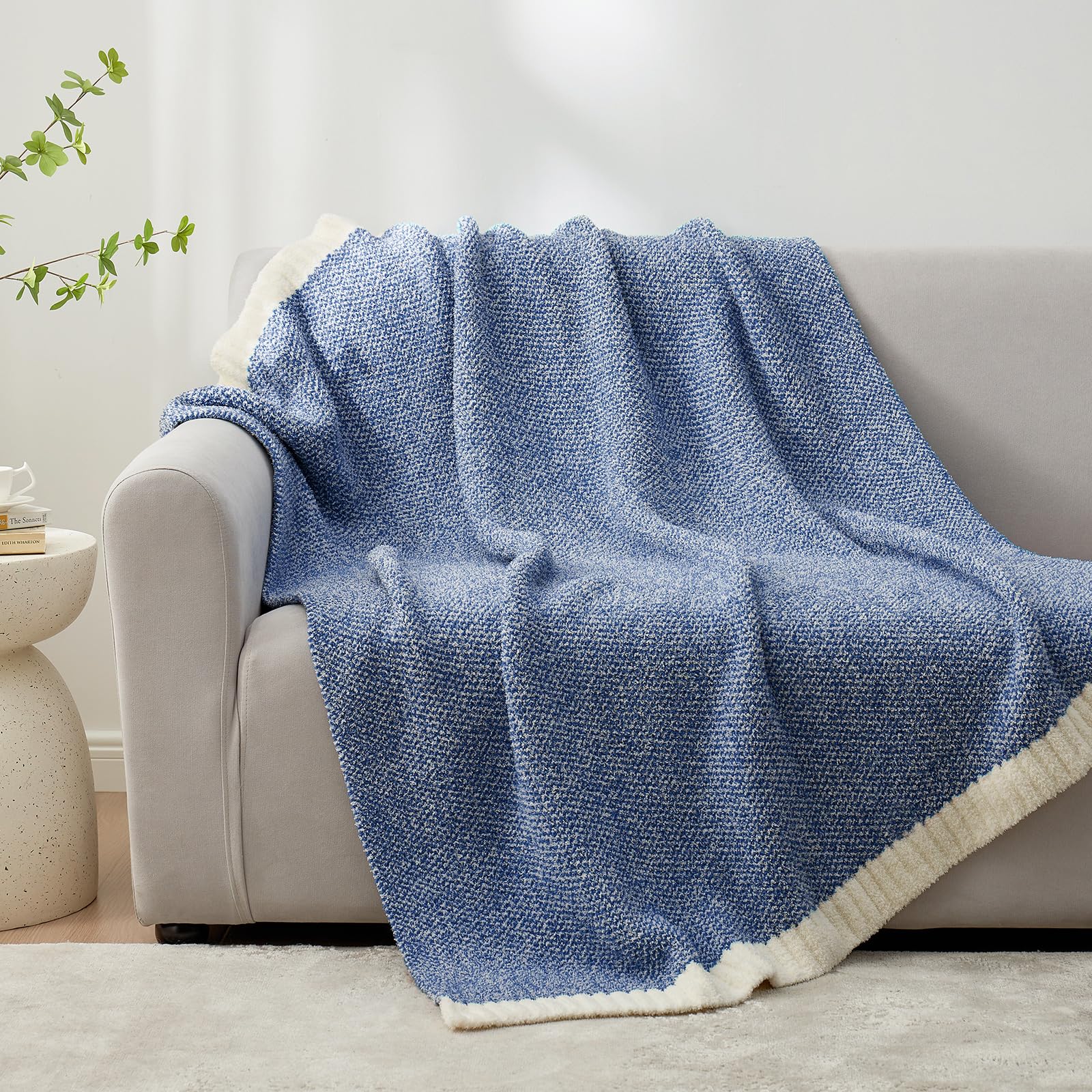 Snuggle Sac draped on a sofa adding warmth and stylish living-room comfort