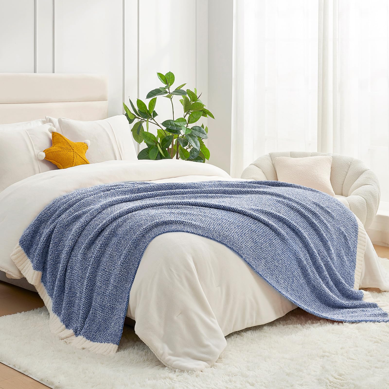 Snuggle Sac beside a ruler indicating 50x60 inch size and scale