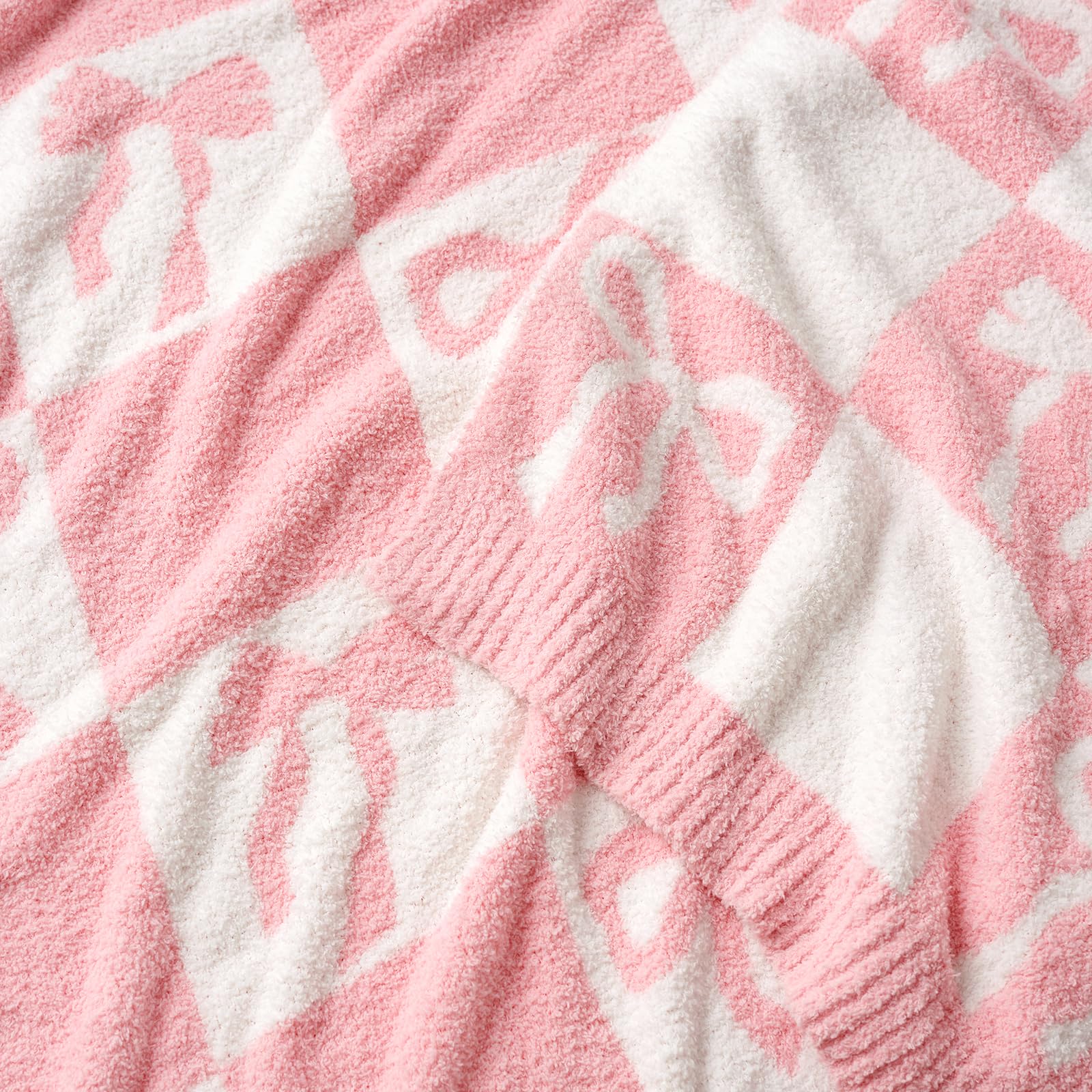 Snuggle Sac next to laptop showing compact 50x60 size scale